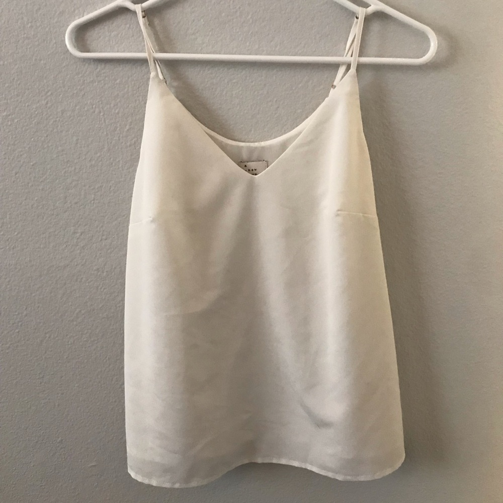 a new day White Tank